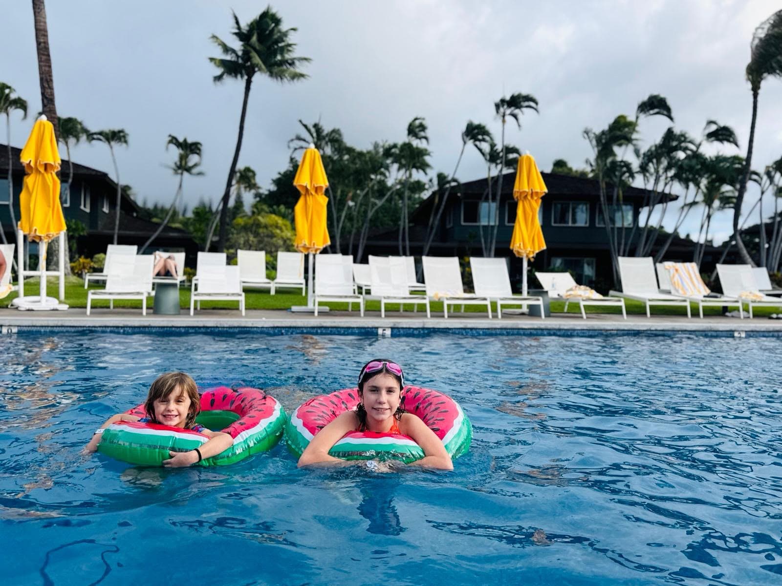 Kids enjoying a swim in the pool